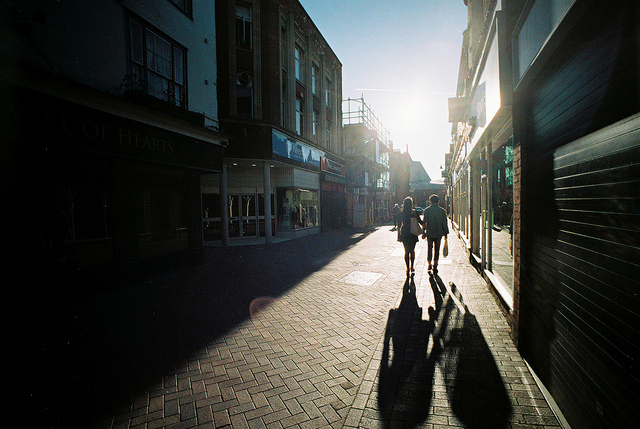 A Couple Walking with Shadows．Photo by Nick Page